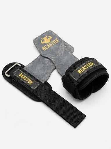 Close-up of BEASTOX Pro Weight Lifting Straps featuring grey suede grip and black nylon strap with reinforced stitching.